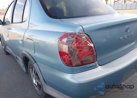 2001 Toyota Echo из США, поврежденный, VIN JTDBT123710177921